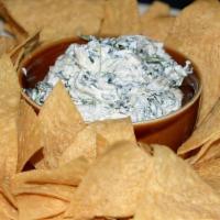 Spinach Artichoke Dip · Served with fresh tortilla chips.