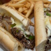 Philly Cheesesteak · Beef, peppers, onions, provolone. Served with french fries or chips and pickles.