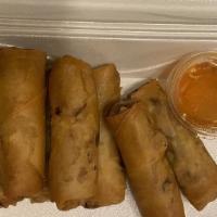 Spring Rolls · Deep-fried vegetables spring roll. Served with sweet and sour sauce.