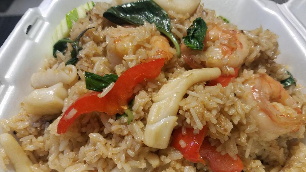 Basil Fried Rice · Basil fried rice. Stir-fried rice with your choice of meat, green chili, red bell, pepper, and basil leaves on hot spicy sauce.