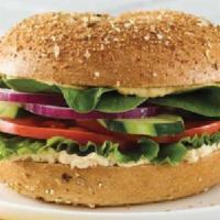 Hummus Veg Out · Your choice of bagel with Hummus, Lettuce, Tomato, Onion, Cucumber, Spinach. Includes your a...