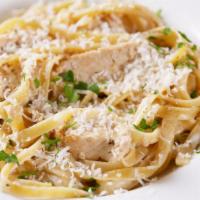 Grilled Chicken Alfredo · Includes side salad and garlic bread.