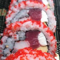 Red Ruby Roll · Tuna, salmon, crab, white fish, cucumber, avocado topped red tobiko.