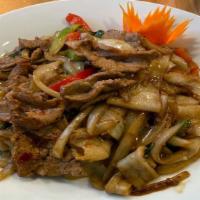 (L) Drunken Noodles · Spicy. Stir-fried flat, wide rice noodles, onions, scallions, tomatoes, bell pepper, chili, ...