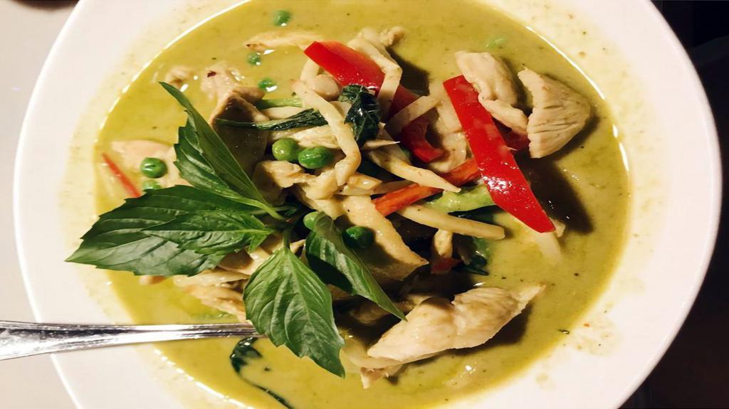 (L) Green Curry · Spicy. Green curry paste, green chilies, coconut milk, bamboo shoots, bell peppers and fresh basil. Served with white jasmine rice.