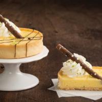 Tart - Key Lime  · Our Key Lime Tart has a sweet, buttery tart shell filled with a key lime curd, topped with w...