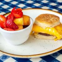 All American Biscuit · Egg, American cheese, and choice of bacon or sausage. Served on a house biscuit.