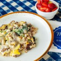 Bennett'S Scramble · Eggs, sausage, spinach, onion, and aged white Cheddar, served with hashbrown casserole.