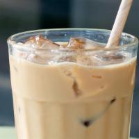 New Orleans-Style Iced Coffee · Cold brewed coffee with chicory, whole milk & cane sugar.