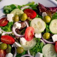 Greek Salad · Olives, tomato, feta cheese, cucumber, onion & lemon-olive oil vinaigrette.