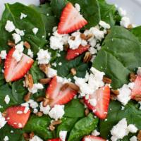 Spinach Salad · Baby spinach, goat cheese, pecans, strawberries & dijon vinaigrette.