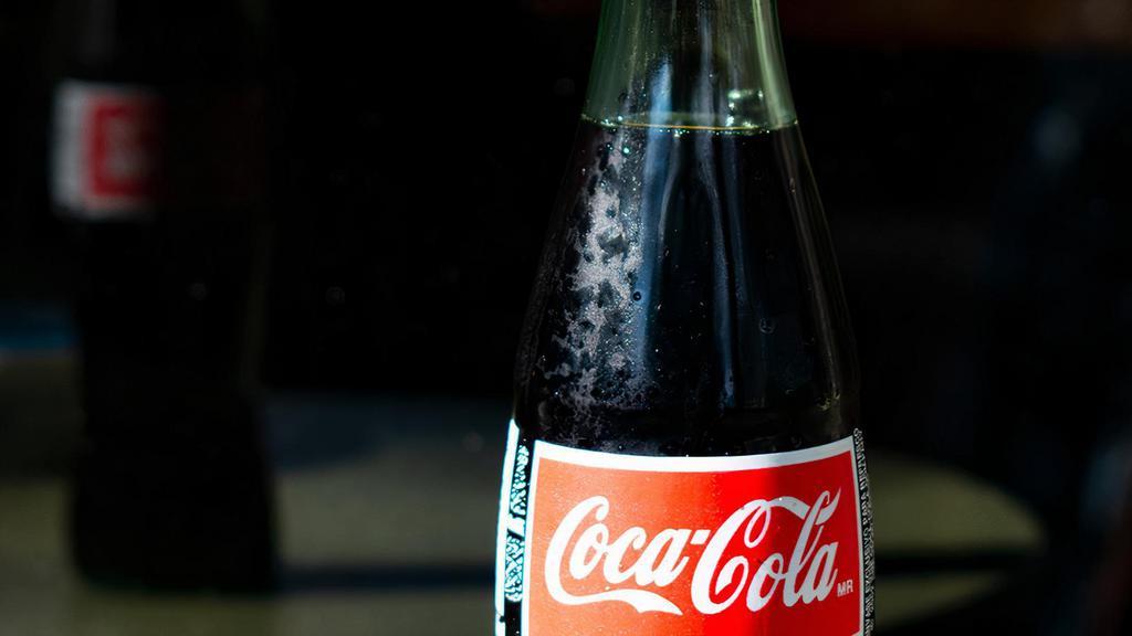 Coca Cola · Mexican coca cola in glass bottle.