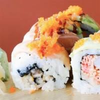 Quickway Rolls · Spicy crab and shrimp inside and avocado salmon on top.