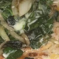 Pollo Tapatio · Grilled chicken breast with onions. Mushrooms, spinach, cheese dip on top. Served with rice,...
