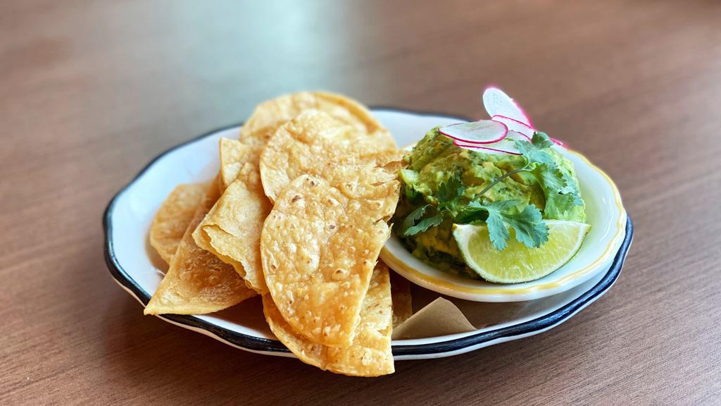Guacamole · Fresh avocado with jalapeño, onion, cilantro and lime served with thick corn masa chips. *vegetarian *gluten-free.