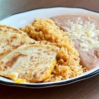 Kid'S Cheese Quesadilla · Flour tortillas, cheese. Served with mexican rice, and 2x frijoles.