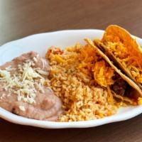 Kid'S Beef Taco (Crispy) · Two crispy shells filled with beef picadillo and shredded cheese. Served with mexican rice, ...