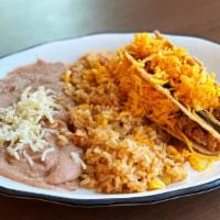 Kid'S Chicken Taco (Crispy) · Two crispy shells filled with grilled chicken and shredded cheese. Served with mexican rice ...