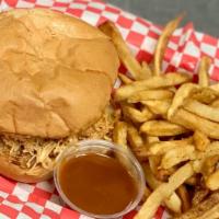 Jesse James · Shredded chicken in a sweet homemade BBQ sauce on a toasted kaiser roll. Served with a side ...