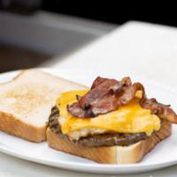 Wyatt'S Patty Melt Burger · 1/4 lb. burger topped with sautéed onions and your choice of cheese between two slices of Te...