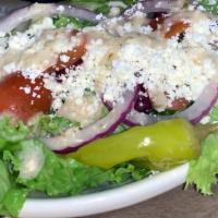 Greek Salad · Lettuce, feta cheese, olives, red onions, tomatoes, pepperoncini, and Greek dressing. Add ch...