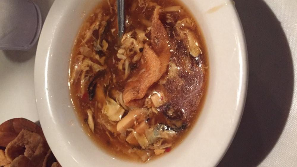 Hot & Sour Soup · Mildly spicy. Rich, spicy broth with chicken, bean curd, and bamboo shoots.