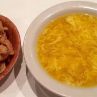 Egg Drop Soup · Our traditional rich broth and drops of egg.