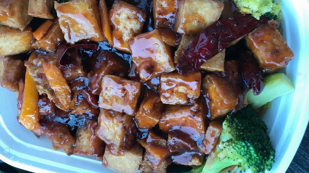 Ma Po Tofu (Bean Curd Szechuan) · Mildly spicy. Tofu stir-fried with mushrooms, peas, and carrots in our spicy brown sauce.