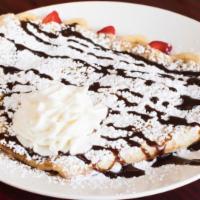 Nutella Crepe · Nutella, fresh strawberries, bananas and powdered sugar.

Consuming raw or undercooked meats...