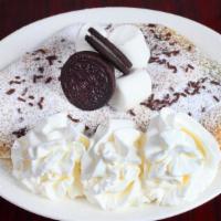 Oreo Crepe · Oreo cookies, condensed milk, marshmallows, chocolate sprinkles, powdered sugar.