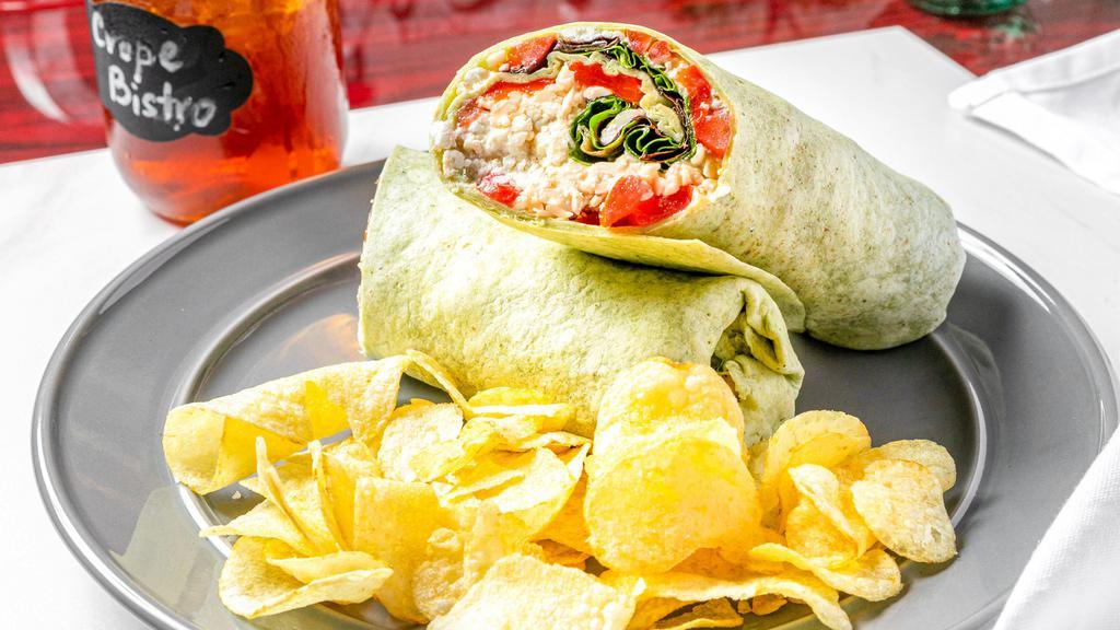 Vegetarian Wrap · Spinach, tomatoes, roasted red peppers, goat cheese, mozzarella & balsamic vinaigrette .