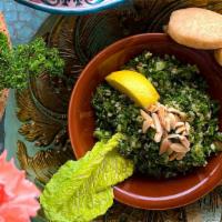 Tabbouleh Salad · Finely chopped parsley with cracked wheat, diced tomatoes, diced cucumbers, and fresh mint i...