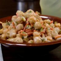 Chickpeas Salad · Chickpeas, blanched carrots, diced red onions, tossed in red wine vinegar and mustard.