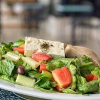 Greek Salad (Lunch) · Crisp romaine and organic mixed greens, Roma tomatoes, English cucumbers, Kalamata olives, G...
