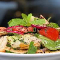 Fattoush Salad (Lunch) · Crisp romaine and organic mixed greens, sliced radishes, red onions, English cucumbers, Roma...