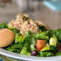 Tuna Garden Salad (Lunch) · Crisp romaine and organic mixed greens, English cucumbers, Roma tomatoes, and Kalamata olive...