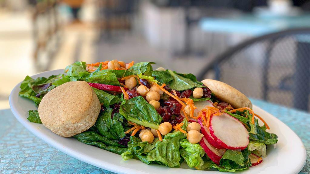 Salata Salad (Lunch) · Crisp romaine and organic mixed greens, chickpeas, dried cranberries, radishes, and shredded carrots. Comes with our Baladi house dressing and our homemade pita bread.
