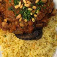 Moussaka (Lunch) · Roasted Bharat spiced eggplant steaks topped with ripe tomato, chickpeas, diced onion, and m...