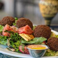 Falafel Salad Platter (Lunch) · Homemade falafel over fattoush salad (sliced radishes, red onions, cucumbers, tomato, fresh ...
