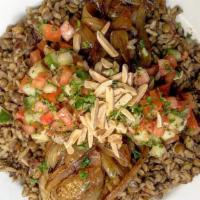 Mujaddarah (Lunch) · A cardamom-spiced brown rice and whole brown lentils pilaf, topped with caramelized onions, ...