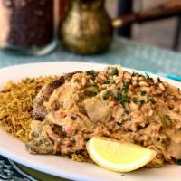  Grouper With Mild Spicy Tahini Sauce (Lunch) · Pan seared fillet of grouper topped with spicy tahini sauce and diced tomatoes, shredded car...