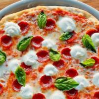 Trio Pizza · Tomato sauce, whole milk mozzarella, pepperoni, ricotta, and fresh basil.