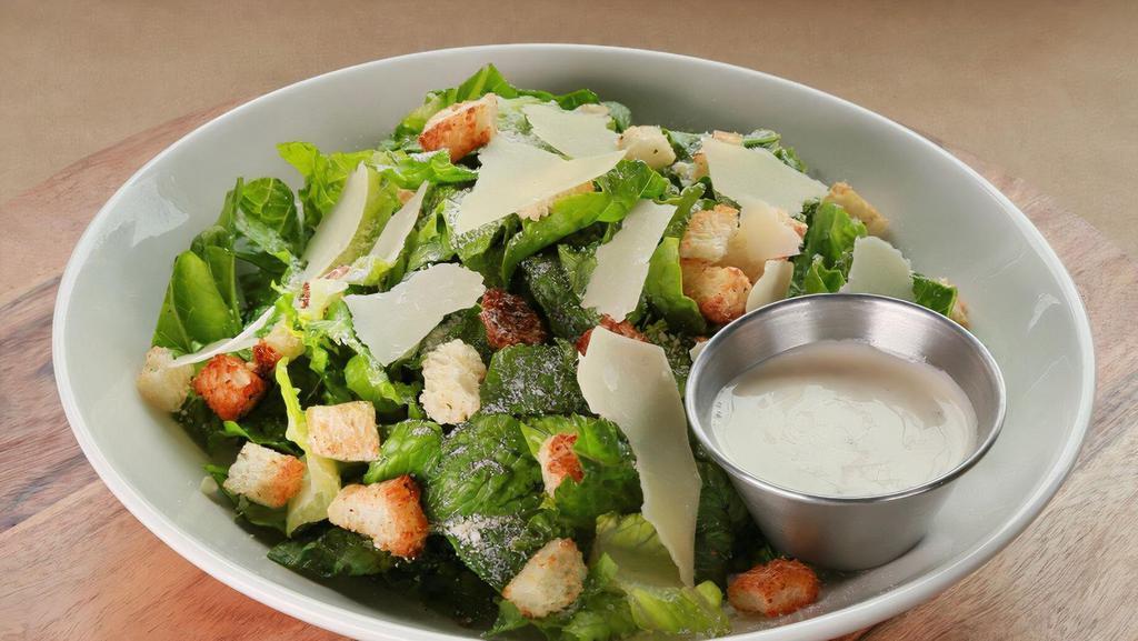Caesar Salad · Crisp romaine, parmigiano reggiano, homemade croutons, Caesar dressing. V