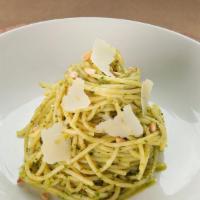 Spaghetti Pesto Pasta · Basil pesto, shaved parmigiano reggiano and evoo. V