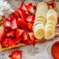 Waffle With Fruit · Waffle, fruit, toppings, powder sugar, & whipped cream.