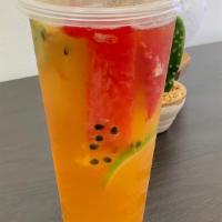 Dream Loaded Fruit Tea · Jasmine tea based drink made with variety of fruits: strawberry, kiwi, passion fruit, orange...