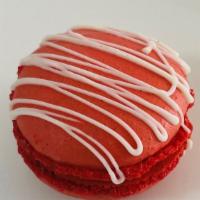 Red Velvet Macaron · Red Velvet Macaron topped with white chocolate drizzle