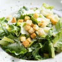 Classic Caesar Salad · Fresh romaine tossed with parmesan cheese & croutons,  Caesar dressing.