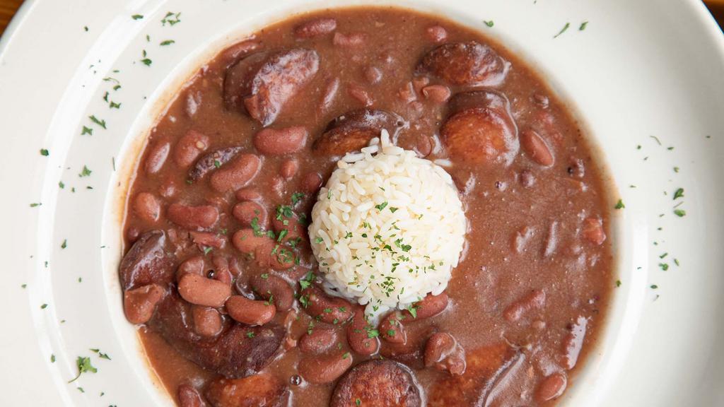 Red Beans & Rice · Traditionally eaten by locals on Mondays, available here daily, served with andouille sausage