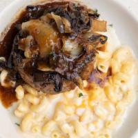 Angus Hamburger Steak · Sautéed mushrooms, grilled onions, rich gravy, creamy  mac n cheese
